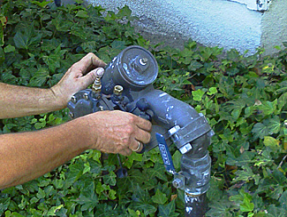 San Bruno CA irrigation contractor inspects a backflow prevention device